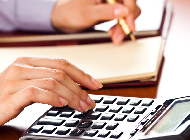  Business person doing monthly accounts