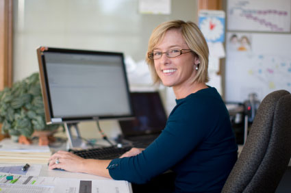 Smiling business woman talking on the phone